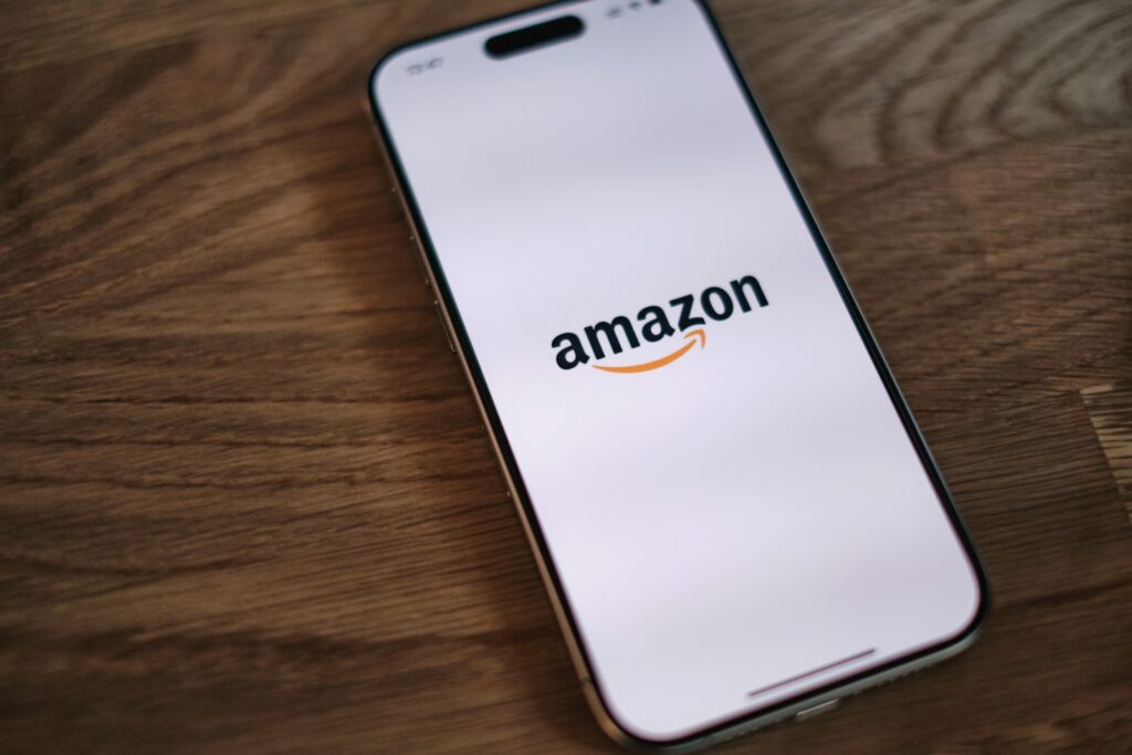 Amazon App, A close up of a cell phone on a table